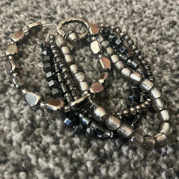 Set of four gently used bracelets. - Picture 10 of 11